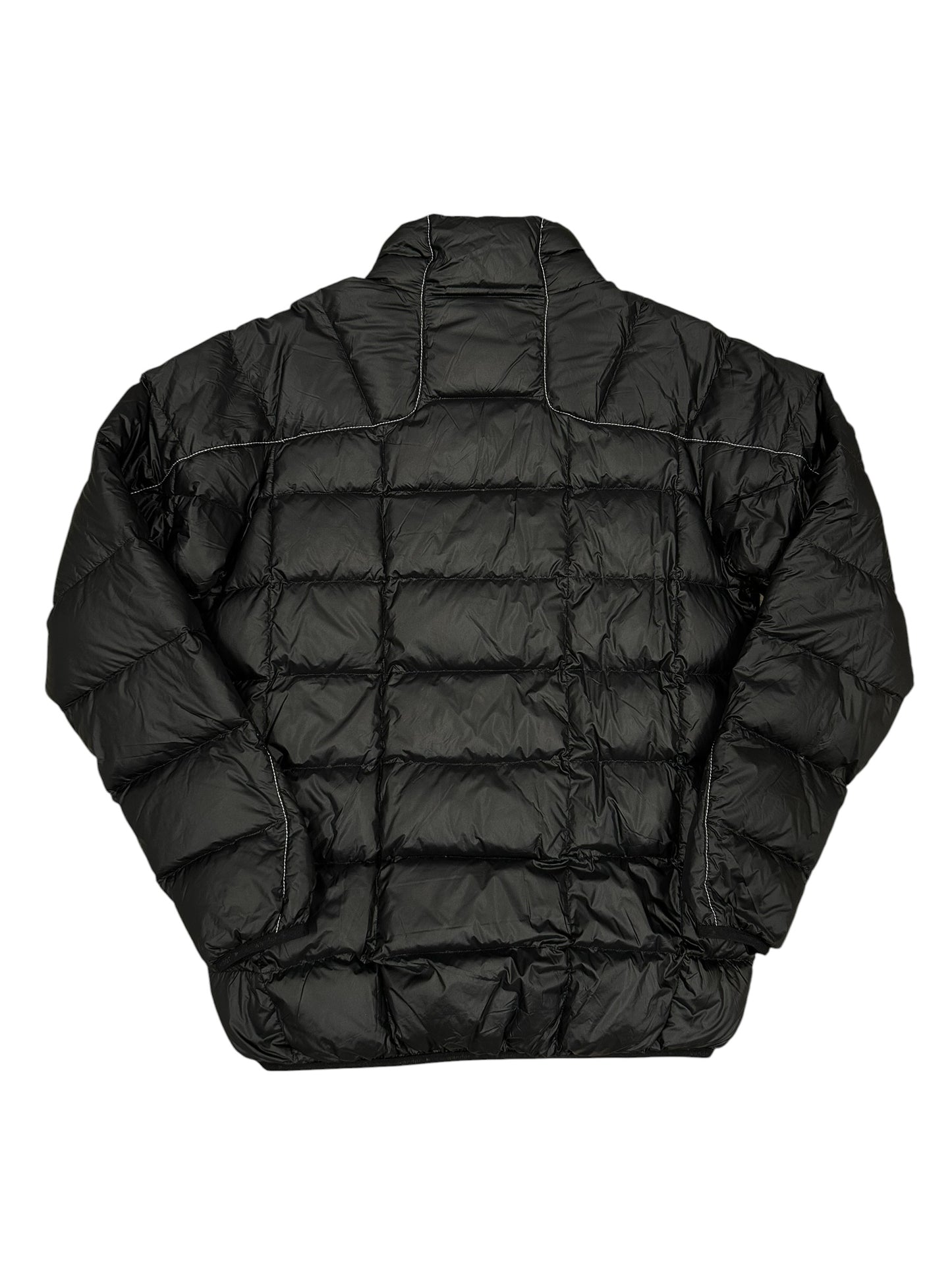 Chaqueta acolchada negra And Wander técnica ligera