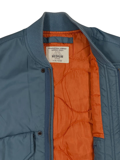 Chaleco Maharishi utility azul con bolsillos múltiples (insulated vest)