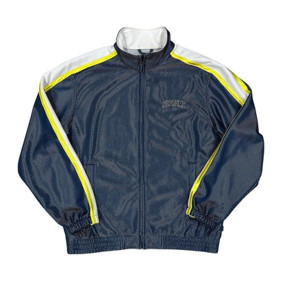 Chaqueta Supreme mesh track azul con paneles reflectantes amarillo y logo bordado