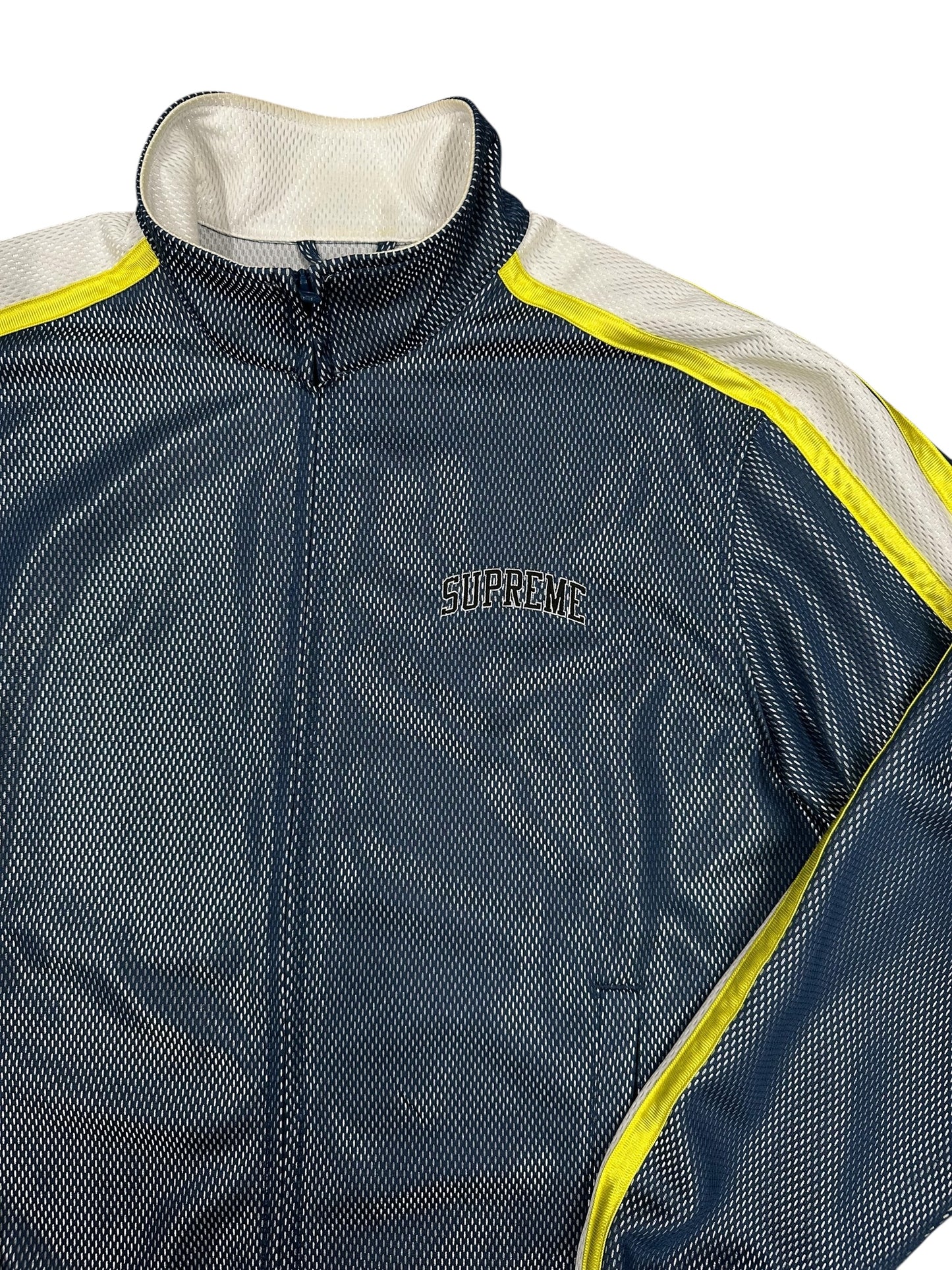 Chaqueta Supreme mesh track azul con paneles reflectantes amarillo y logo bordado