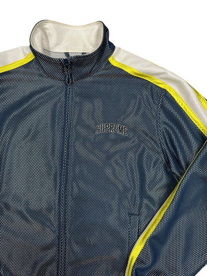 Chaqueta Supreme mesh track azul con paneles reflectantes amarillo y logo bordado