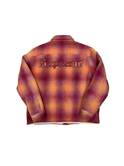 Chaqueta Supreme overshirt a cuadros rojo y naranja con logo bordado trasero