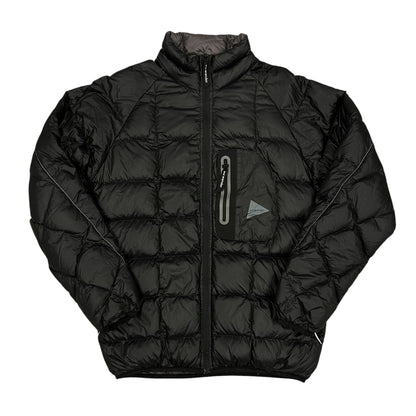 Chaqueta acolchada negra And Wander técnica ligera