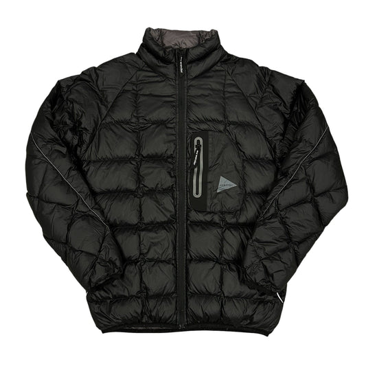 Chaqueta acolchada negra And Wander técnica ligera
