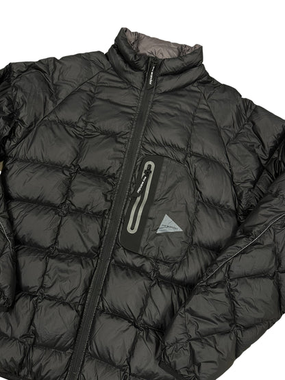 Chaqueta acolchada negra And Wander técnica ligera