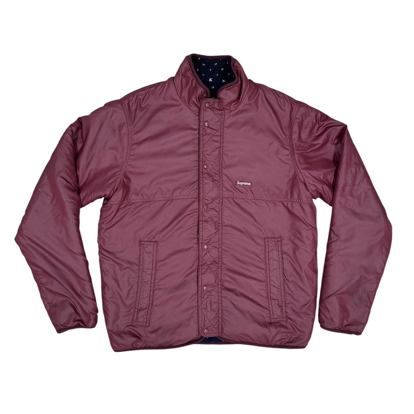 Chaqueta Supreme reversible acolchada granate / forro sherpa azul marino