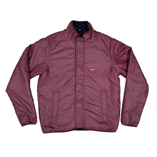 Chaqueta Supreme reversible acolchada granate / forro sherpa azul marino