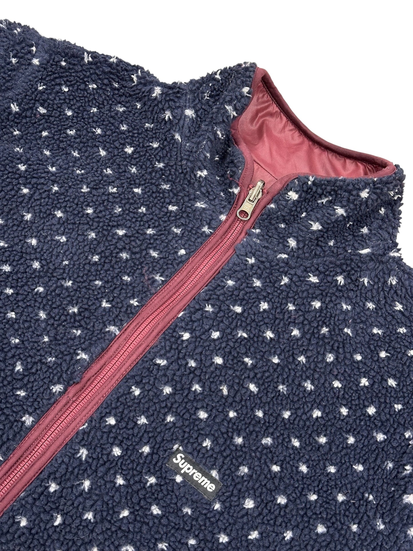 Chaqueta Supreme reversible acolchada granate / forro sherpa azul marino